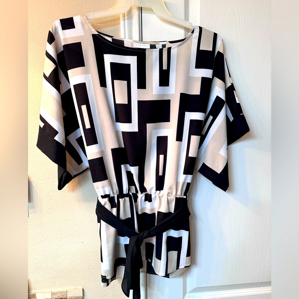 Tunic style blouse.